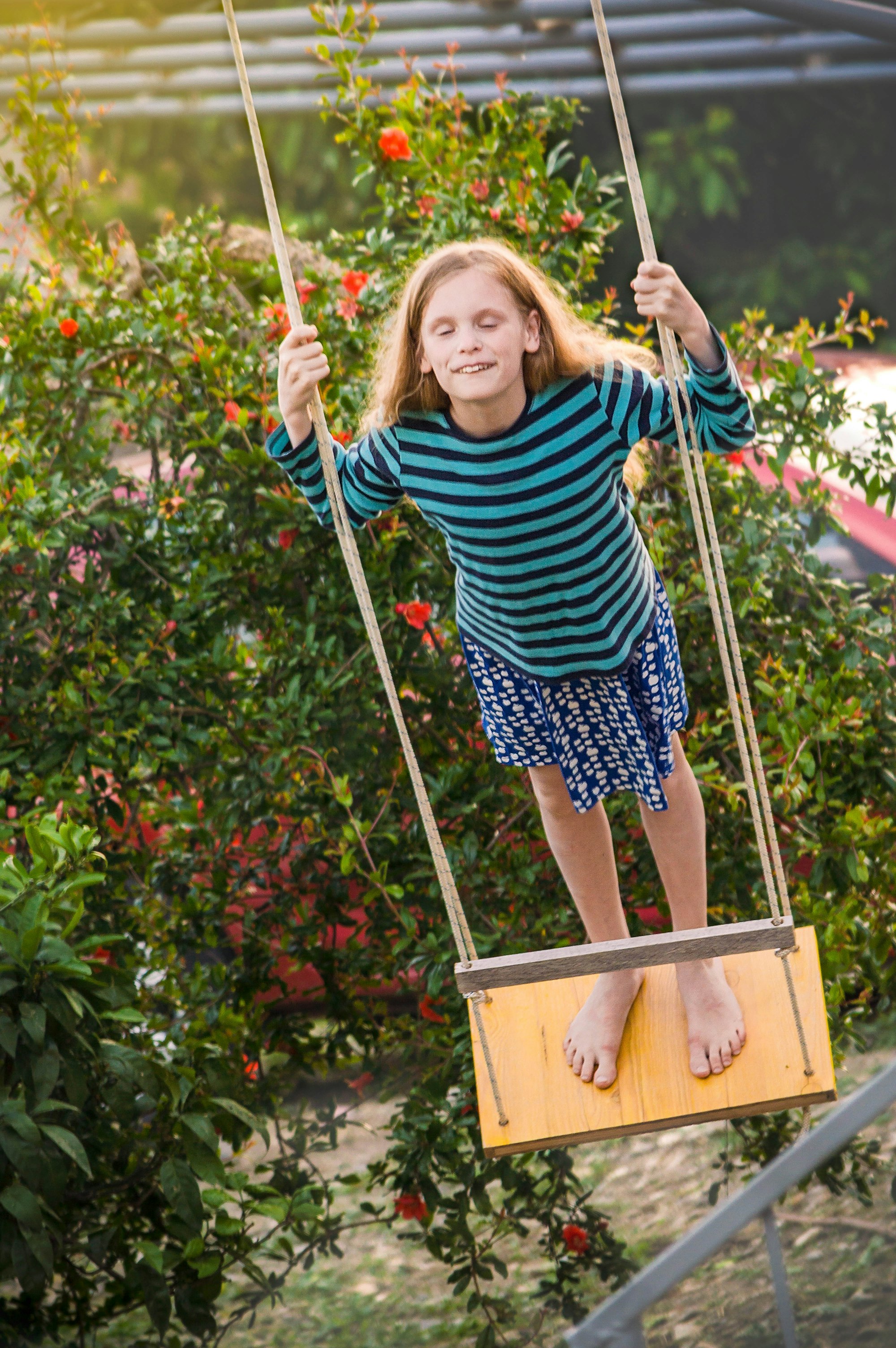 Child model on a garden swing, Twirl template demo