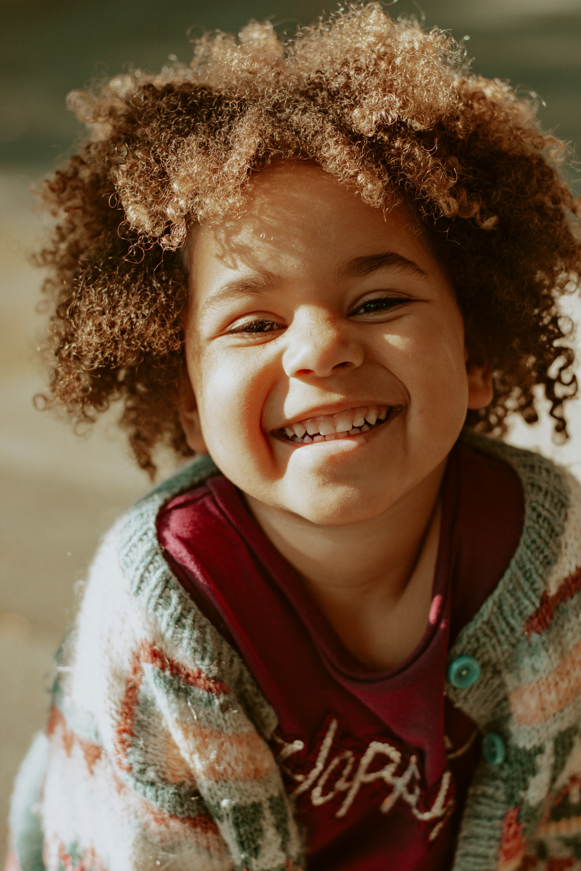 Laughing child model with curly hair, Acorn template demo